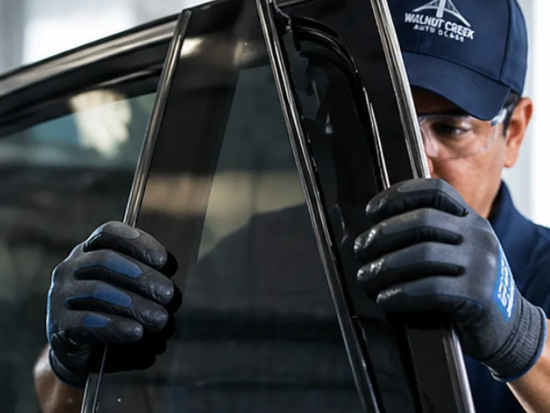 Walnut Creek Auto Glass technician installing door glass